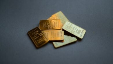 Illustrative photograph of gold bullion bars; not an ABC Bullion product image