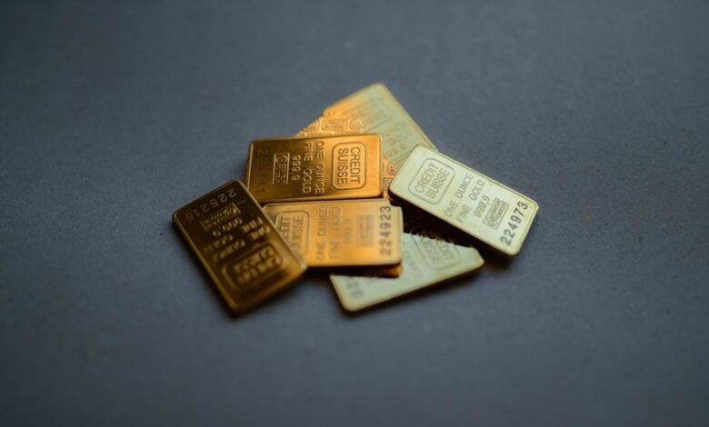 Illustrative photograph of gold bullion bars; not an ABC Bullion product image