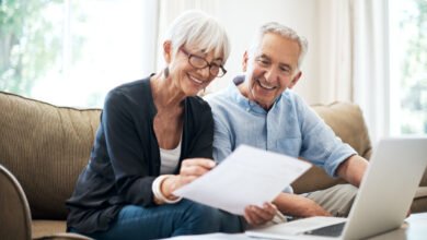 An older couple reviewing their retirement savings, relevant to Centrelink deeming rates