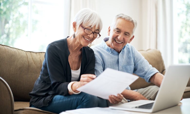 An older couple reviewing their retirement savings, relevant to Centrelink deeming rates