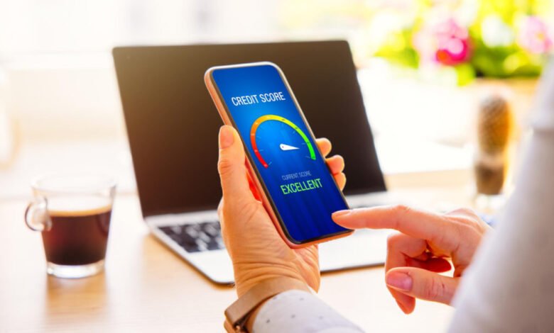 Woman checking her credit score on her phone