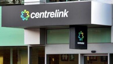Centrelink storefront sign — a Q230 financial hardship letter is issued by Centrelink (Services Australia)