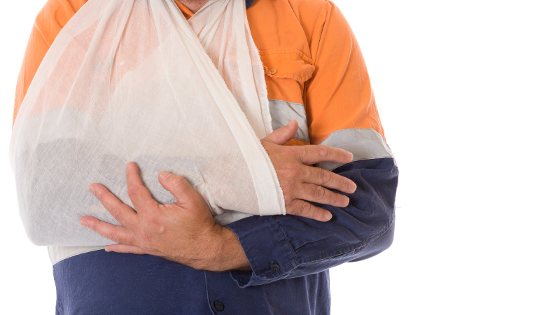 Worker with an injured arm in a sling